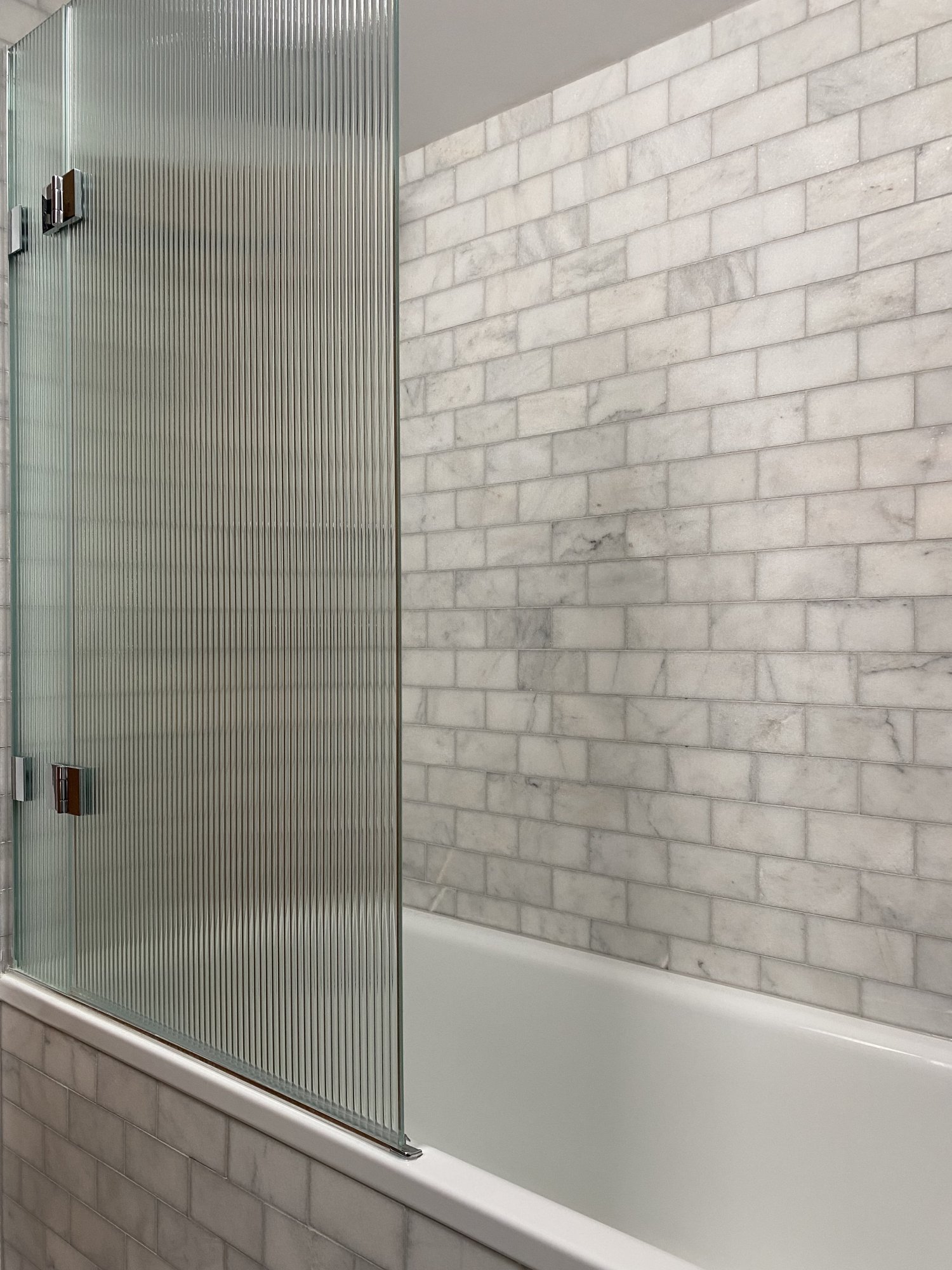West One Bathrooms Fluted Glass Bath Screen